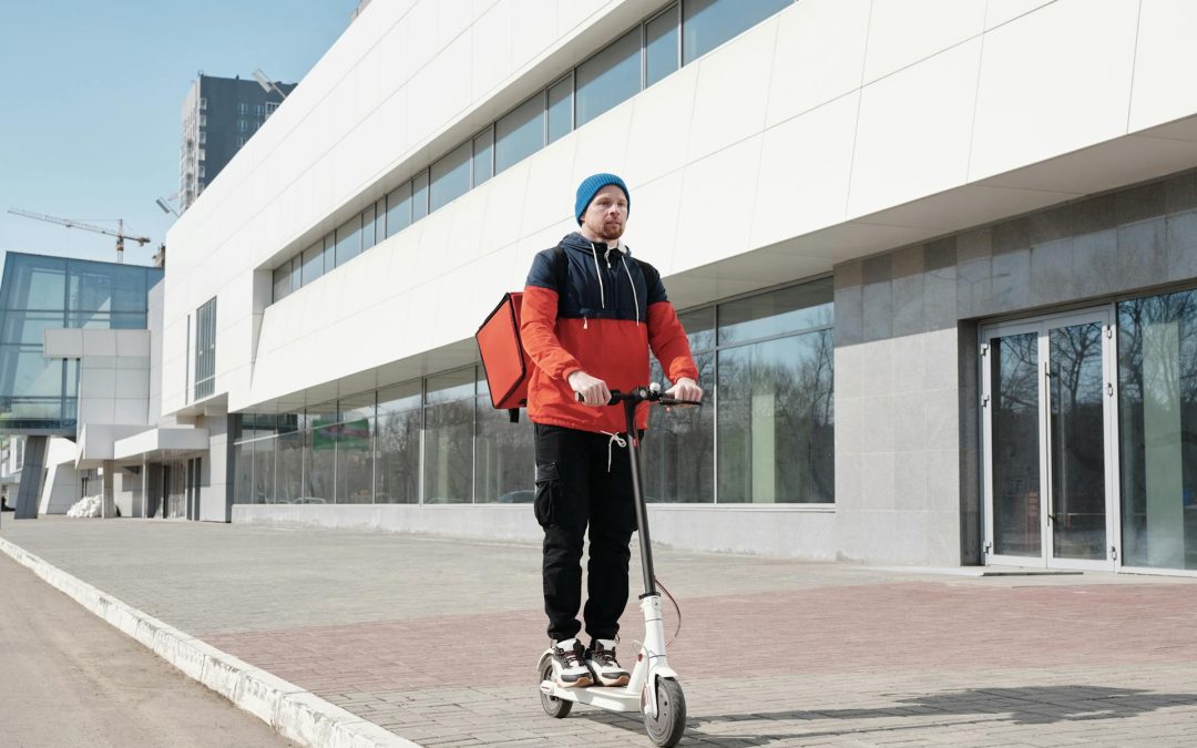 A Person Standing Beside a Scooter